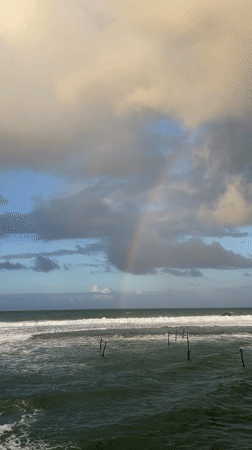 Witness documents Sri Lankan coastal scenes with rainbow