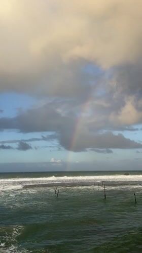 Witness documents Sri Lankan coastal scenes with rainbow