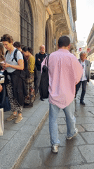 Milan pedestrian and shoe workshop activity documented Friday morning