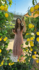 Floral dress and coffee: a mirror selfie moment in Moscow