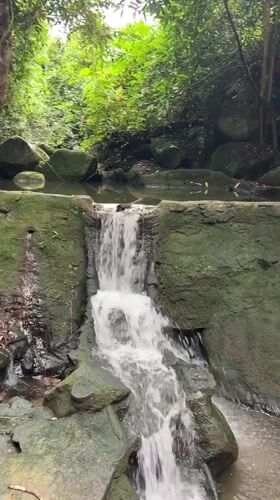 Mossy waterfall tucked into Ko Samui's jungle interior