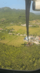 Aerial view captured over Del Carmen, Philippines from small aircraft