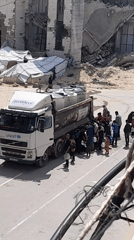 UNICEF delivers humanitarian aid to crowds in war-damaged Khan Yunis