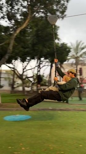 Family playground activity and flag displays in Kiryat Bialik