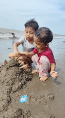 Beach play on the shores of Lhokseumawe, Indonesia