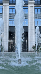 Fountain operates in Khimki, Russia near modern building