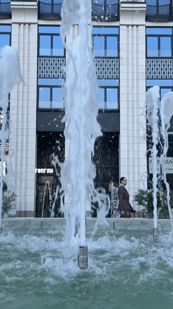 Fountain operates in Khimki, Russia near modern building
