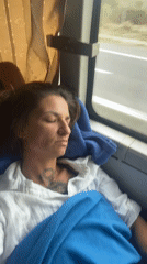 Woman sleeps on public transport in Vietnam