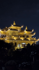 Nighttime scenes captured around illuminated Xuan Huong Lake, Da Lat