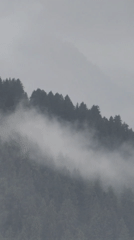 Mist and snow over the mountains near Siumsa