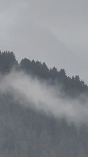 Mist and snow over the mountains near Siumsa