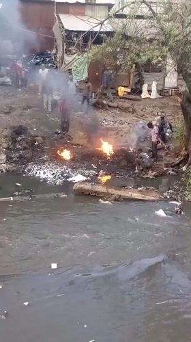 Fires, damaged vehicle reported near polluted Nairobi riverbank
