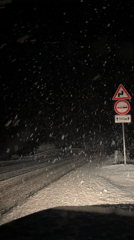 Heavy snowfall blankets roads and vehicles in Smolyan, Bulgaria
