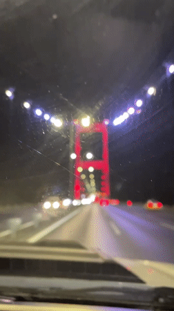 Nighttime drive across a lit bridge in Beykoz