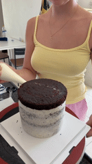 Cake decorating and dessert prep in Tel Aviv