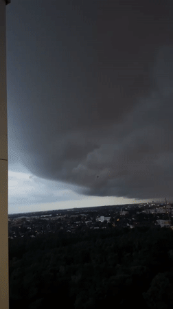 Storm clouds move over Berlin at dusk