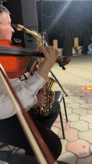 Late-night folk ensemble plays outdoors in rural Moldova