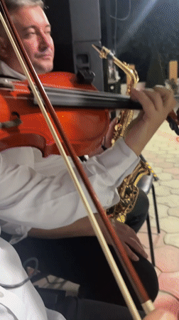 Late-night folk ensemble plays outdoors in rural Moldova