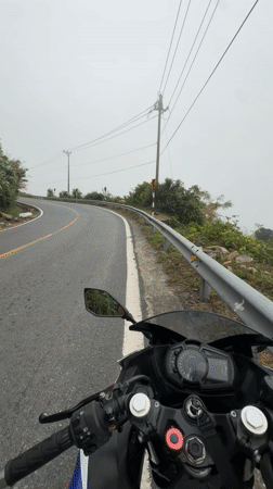Motorcycle ride captured on winding road near Đà Nẵng