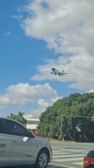 Aerolineas Argentinas plane descends over Buenos Aires intersection