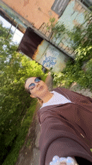 Woman films selfie video while walking in Perm, Russia
