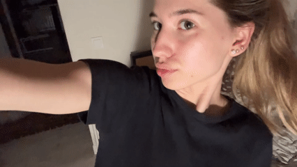 Woman documents mirror selfie session in Noviy, Russia bedroom