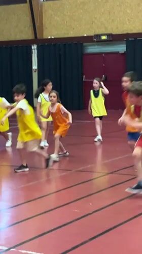 Children play organized games at La Fouillouse gymnasium