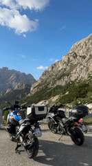 Cars, bikes, and hikers out in the Dolomites near Cortina
