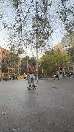 Evening street life and skateboarding in Barcelona squares