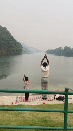 Morning yoga and boats at Fewa Lake, Pokhara