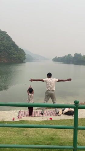 Morning yoga and boats at Fewa Lake, Pokhara