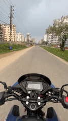 Motorcycle ride documented through tree-lined Nasirabad streets