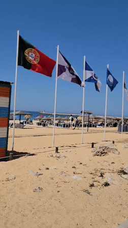 Quiet summer morning at Quarteira beach, Algarve