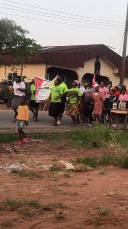 Group with banner walks through Idonyi, Nigeria streets