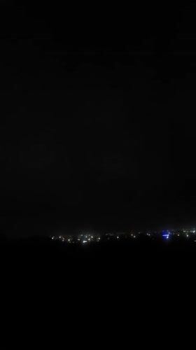 Evening in Gura Top: streets, markets, and stormy skies