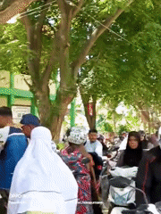 Students gather at Lhokseumawe school during early morning hours