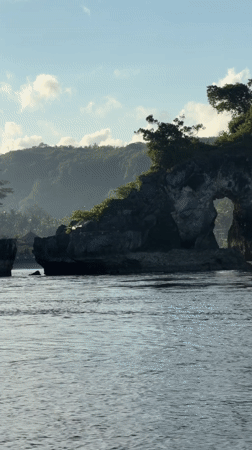 Natural rock archway captured off Nusa Penida Indonesia