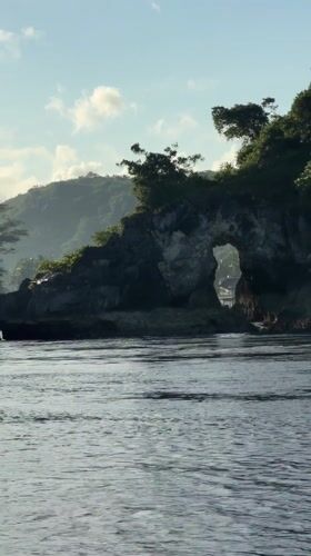 Natural rock archway captured off Nusa Penida Indonesia
