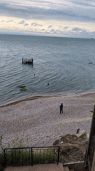 Visitor documents leisurely morning at Odesa pier with snacks