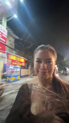 Woman films herself walking on North Jakarta street