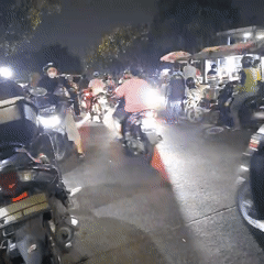 Late-night street food scene outside Waroeng Pink 89, East Jakarta