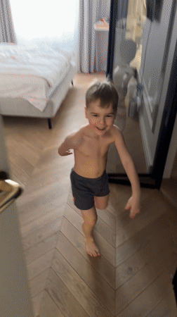 Child plays with adult in Krasnoyarsk home