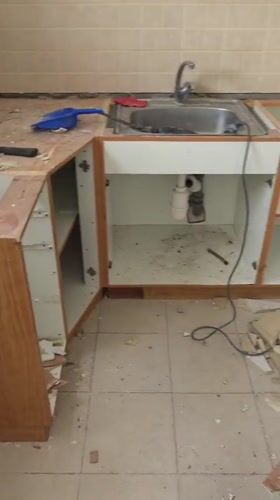Kitchen renovation underway in Bat Yam shows dismantled sink area