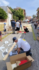 Community Creates Floral Street Carpet in Ripollet Spain