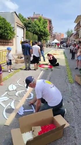 Community Creates Floral Street Carpet in Ripollet Spain
