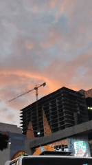 Construction site with crane observed during sunset in Caracas
