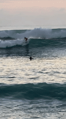 Beach day captured: surfing and sunset in Kuta Selatan