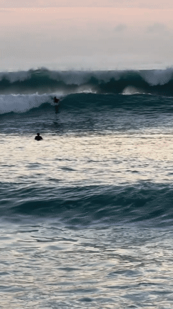 Beach day captured: surfing and sunset in Kuta Selatan