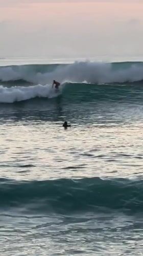 Beach day captured: surfing and sunset in Kuta Selatan