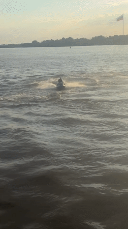 Dancing on the promenade, jet skis on the Volga at golden hour
